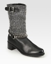 Woven boucle mixes with supple leather and metal hardware in this street-ready design. Stacked heel, 2 (50mm)Shaft, 10Leg circumference, 12Boucle and leather upperPull-on style with adjustable buckle strapLeather liningRubber solePadded insoleMade in SpainOUR FIT MODEL RECOMMENDS ordering true size. 