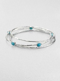 From the Rock Candy® Collection. A trio of hammered, sterling silver bangles accented with colorful, faceted turquoise. Sterling silverTurquoiseDiameter, about 2.5Slip-on styleImported 