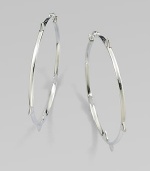 From the Thorn Collection. Slender, square-edged hoops, sprinkled with spiky thorns, too tiny to be truly menacing. Sterling silverDiameter, about 1¾PiercedImported