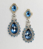 An exquisite teardrop design with beautiful faceted London blue topaz and blue topaz stones set in sterling silver and accented with 18k gold. Sterling silver18k goldBlue topazLondon blue topazDrop, about 1.75Post backImported 