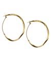 These RACHEL Rachel Roy hoops feature an uneven, organic body for an au naturel appearance. Set in worn gold tone mixed metal. Approximate diameter: 3-1/4 inches.