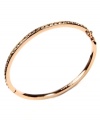 Polished and sleek. Givenchy's rose gold tone bangle bracelet features silk glass stones. Approximate diameter: 2-1/2 inches.