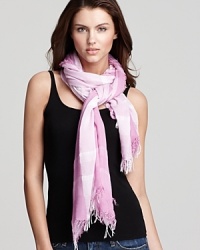 Accent your favorite ensemble with this stylish crinkle plaid scarf from Fraas.