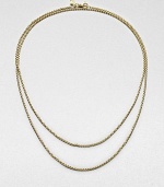 A baby box chain necklace in radiant 18k gold. 18k goldLength, about 32Lobster clasp closureImported 