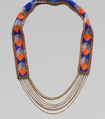 Colorful glass beads in striking geometric shapes cover a leather strap, edged in bold chains with delicate chains draped at the bottom.GlassLeatherGoldtoneCotton backingLength, about 18½Imported