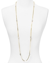 Simply designed and plated in high-shine metal, this Michael Kors link necklace styles every look with classic glamor.