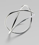 A simply chic, sterling silver style with an unique crossed design. Sterling silverSlip-on styleDiameter, about 2½Imported 