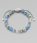 From the Spiritual Bead Collection. Singing the blues with a pretty strand in soft blue shades, combining beads of blue chalcedony, aquamarine, moon quartz and sterling silver with an oval cable slide clasp.Blue chalcedony, aquamarine and moon quartzSterling silverDiameter, about 2Adjustable slide claspImported