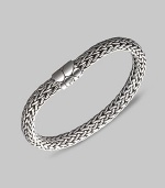 From the Kali Collection. An intricately woven strand of sterling silver with a textured barrel clasp. Sterling silver Length, about 7½ Push-lock clasp Made in Bali.