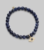 The evil eye, rendered in diamonds and sapphires, makes a graceful amulet, thought to offer protection as it hangs from a stretchy strand of sodalite beads. Diamonds, 0.07 tcw Sapphires Sodalite 14k yellow gold Unstretched diameter, about 2 Imported