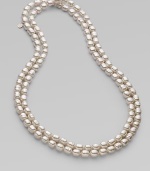 This extra-long and elegant chain of gleaming baroque pearls can be double-wrapped for versatility.10mm baroque pearls Sterling silver Length, about 60 Made in Spain