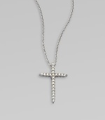 A beautiful cross that sparkles with diamonds in 18k gold on a chain link necklace. Diamonds, .1 tcw18k white goldLength, about 16 to 18 adjustablePendant size, about ½ Lobster clasp closureMade in Italy