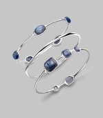 From the Scultura Collection. A delicate, pavé diamond accented style with five kyanite cabochons set in sterling silver. KyaniteDiamonds, .25 tcwSterling silverDiameter, about 2½Slip-on styleImported 