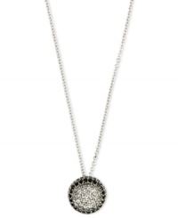 A dazzling design that gets noticed, by Judith Jack. This stunning necklace showcases a circular pendant swirling with marcasite (1/4 ct. t.w.), onyx stones (3/8 ct. t.w.) and crystal (3/8 ct. t.w.). Set in sterling silver. Approximate length: 16 inches. Approximate drop: 1/2 inch.