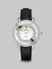 This limited edition timepiece boasts a diamond bezel with mother-of-pearl details on a luxurious alligator strap. Swiss quartz movementWater resistant to 5 ATMRound stainless steel case, 38mm (1.5)Diamond accented mother-of-pearl bezel, .57 tcwMother-of-pearl dialDot hour markersSecond hand Black alligator strap, 16mm wide (0.6)Imported