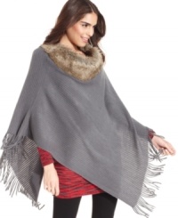 Add a little uptown attitude to your everyday accessorizing with this posh poncho from Big Buddha that features a cozy, faux fur collar and flirty fringe detail.