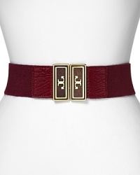 With gold-tone hardware, Tory Burch's elastic belt is a logo-stamped pick-up. For easy elegance, wear it over a classic day dress with gleaming extras.