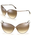 New from Tom Ford! Sleek criss-cross sunglasses in a modern cat eye silhouette.