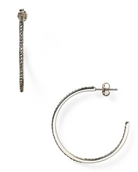 These striking Judith Jack hoop earrings work a simple vibe, but they're exquisitely crafted too-finished in sterling silver with marcastite stone accents.