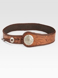 Weathered leather blends rugged style with feminine florals for a bohemian look.2½ wide Loop closure Leather Imported Additional Information Women's Belts Size Guide 