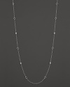 White sapphire stations shine on a sterling silver chain. From Judith Ripka.