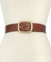 Add a vintage vibe to your everyday look with this Tommy Hilfiger belt, crafted in soft leather and finished with a gleaming golden buckle.