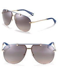 Chic rimless aviator sunglasses get a pop of color along top bar and arms for eye-catching style.