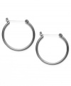 Chic and classic. What could be a better complement for your casual wardrobe than simple yet sleek hoop earrings? Style&co.'s version is crafted in hematite tone mixed metal and equipped with a secure hinge closure. Approximate diameter: 1-1/10 inches.