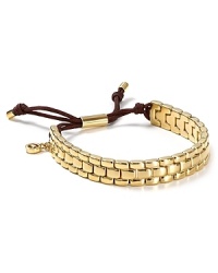 This Michael Kors watch band takes its cues from the jewel box, crafted of gold-tone plate with an adjustable bar closure.