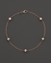 Diamond stations on a fine rose gold chain bracelet.