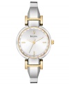 Streamlined and modern, this ultra femme watch from Bulova shines. Silvertone stainless steel bangle bracelet with goldtone accents. Stainless steel round case and dial with logo and stick indices. Quartz movement. Water resistant to 30 meters. 3-year limited warranty.