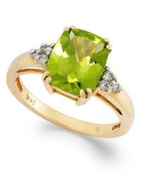 Take your look to the next level with the right amount of color. A rectangular-cut peridot (3-1/4 ct. t.w.) and a crowns of diamond accents add sparkle to this shining 14k gold ring.