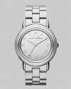 Smart and chic style with a mirror dial for added shine. Quartz movement Water resistant to 5 ATM Round stainless steel case, 36mm (1.4) Silver mirror logo dial Second hand Stainless steel link bracelet, 18mm wide (0.7) Imported 