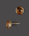 Faceted citrine in intricate 14K yellow gold settings.