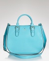 This kate spade new york satchel works quaint sophistication with its rolled top handles, and subtle structure.