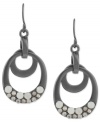 Shapely chic. Kenneth Cole New York's oval drop earrings are crafted from hematite-tone mixed metal with glass pave crystal accents adding a lustrous touch. Approximate drop: 1-1/2 inches.