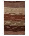 Warm autumnal hues unite with a graceful, undulating pattern, invigorating your space with a striking, yet inviting, allure. Rife with lush texture and detail, this luxurious area rug from Dalyn is beautifully hand tufted in polyester and acrylic, ensuring superior color retention and long-lasting wear.