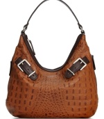 Explore the exotic with this croc-embossed leather hobo from Tignanello. Structured and sophisticated, it flaunts subtle belted detailing and plenty of pockets, for an effortless desk-to-dinner look.