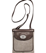 The perfect combination of classic and cool, this easygoing design from Fossil gets a mod makeover in soft metallic suede with vintage-inspired hardware. Carry it to work, on weekend excursions, wherever.