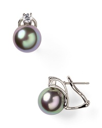 In a cool hue, Majorica's gray pearl earrings are dark, stormy and seriously chic. Slip them in as an alternative to classic whites.