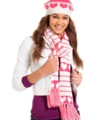 Get wrapped up in something warm and wonderful this winter with this cheery knit scarf from American Rag. Outfitted in pink hearts and stripes, you'll be cute and cozy all season long.