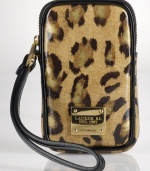 On the prowl. Lauren Ralph Lauren brings exotic appeal to the everyday with this leopard-print case, featuring signature detailing and convenient wristlet strap. Slip it in your handbag or wear it on its own, for a stylish way to stay organized.