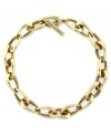 A traditional link to classic style. This golden link necklace from Vince Camuto features oblong links crafted in gold tone mixed metal, includes a toggle closure. Approximate length: 18 inches.