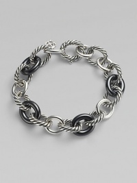 From the Chain Collection. A trinity of signature cable, plain, and black ceramic oval links.Ceramic Sterling silver Length, about 7½ Lobster clasp closure Imported 