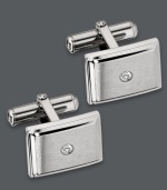 Polish, shine and presentation. Complete your overall look with the perfect finishing touch. Rectangular cuff links feature a sparkling diamond accent set in stainless steel. Crafted with a swivel backing for easy use. Approximate length: 5/8 inch. Approximate width: 1/2 inch.