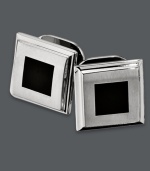 The perfect gift. Set includes four pairs of polished studs. Crafted in stainless steel with a square-shaped black enamel accent. Surface coated with a scratch-resistant clear finish. Approximate diameter: 3/8 inch.