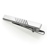 Before you walk out the door, don't forget the extra dapper touch of this Geoffrey Beene polished black nickel tie clip.