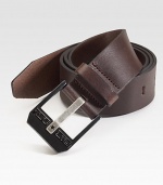 A modern style in smooth leather with a polished logo buckle.LeatherAbout 2½ wideImported