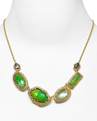 Alexis Bittar's gold and linked stone necklace epitomizes modern accessorizing. It's unique combination of stone and sparkle lends a boho-luxe finish to every neckline.