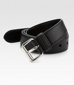 Remarkable style and versatility, set in textured leather with metal buckle.LeatherAbout 1¼ wideMade in Italy